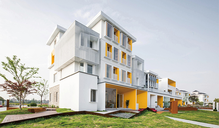 农村自建房改建民宿,让杂乱的建筑群和谐参与到周边